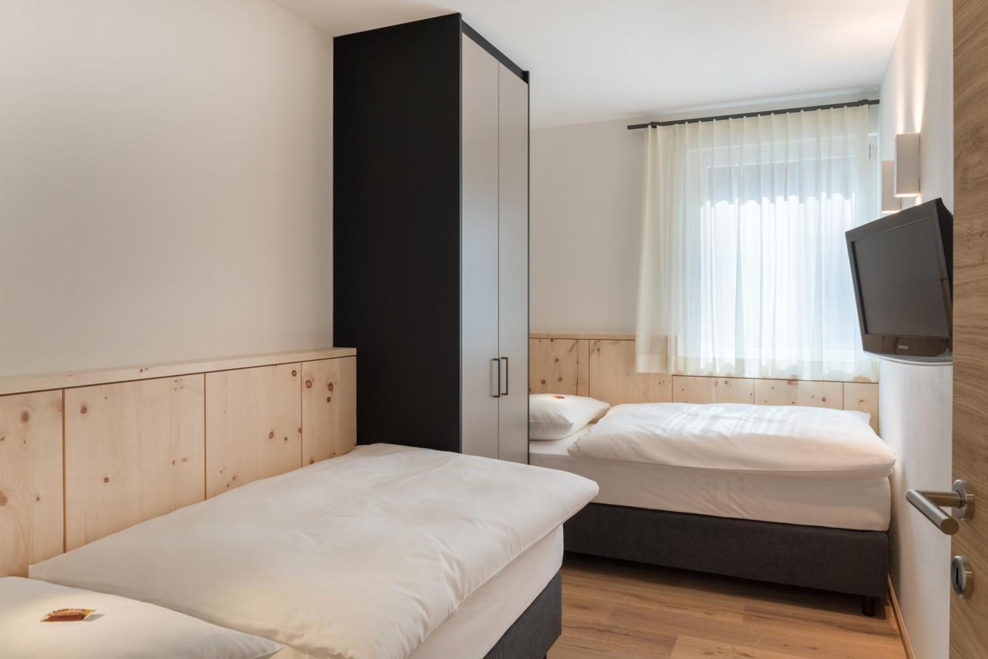 Alpenwellnesshotel St. Veit Sexten Bilik gambar
